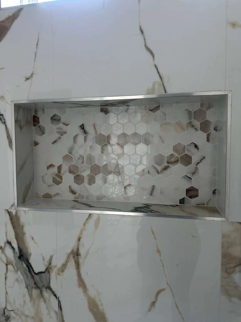 Noliv Construction bathroom remodeling, general renovations and construction, specializing in ceramic tile flooring.