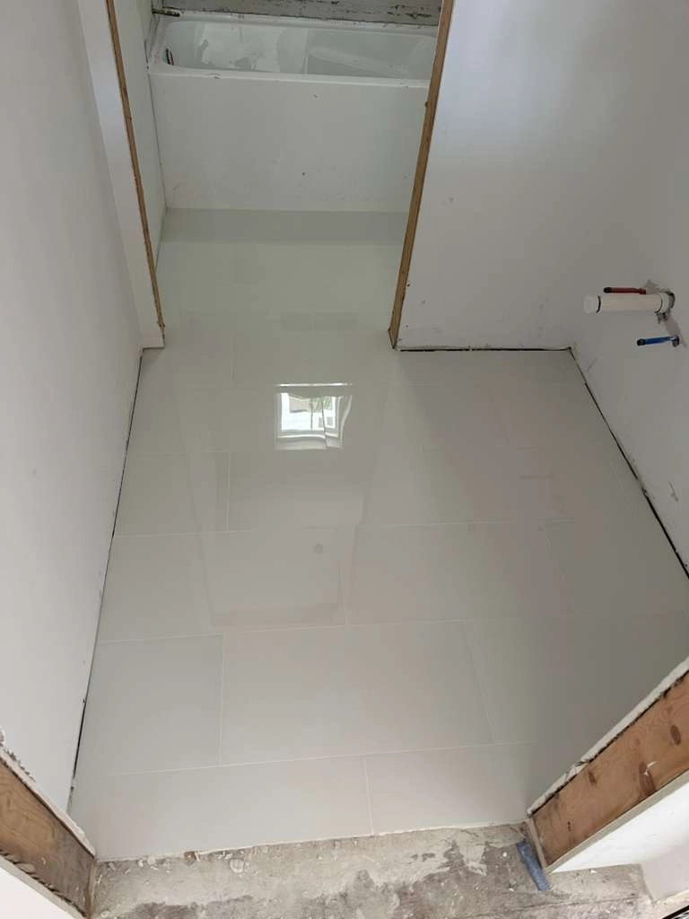 Noliv Construction bathroom remodeling, general renovations and construction, specializing in ceramic tile flooring.