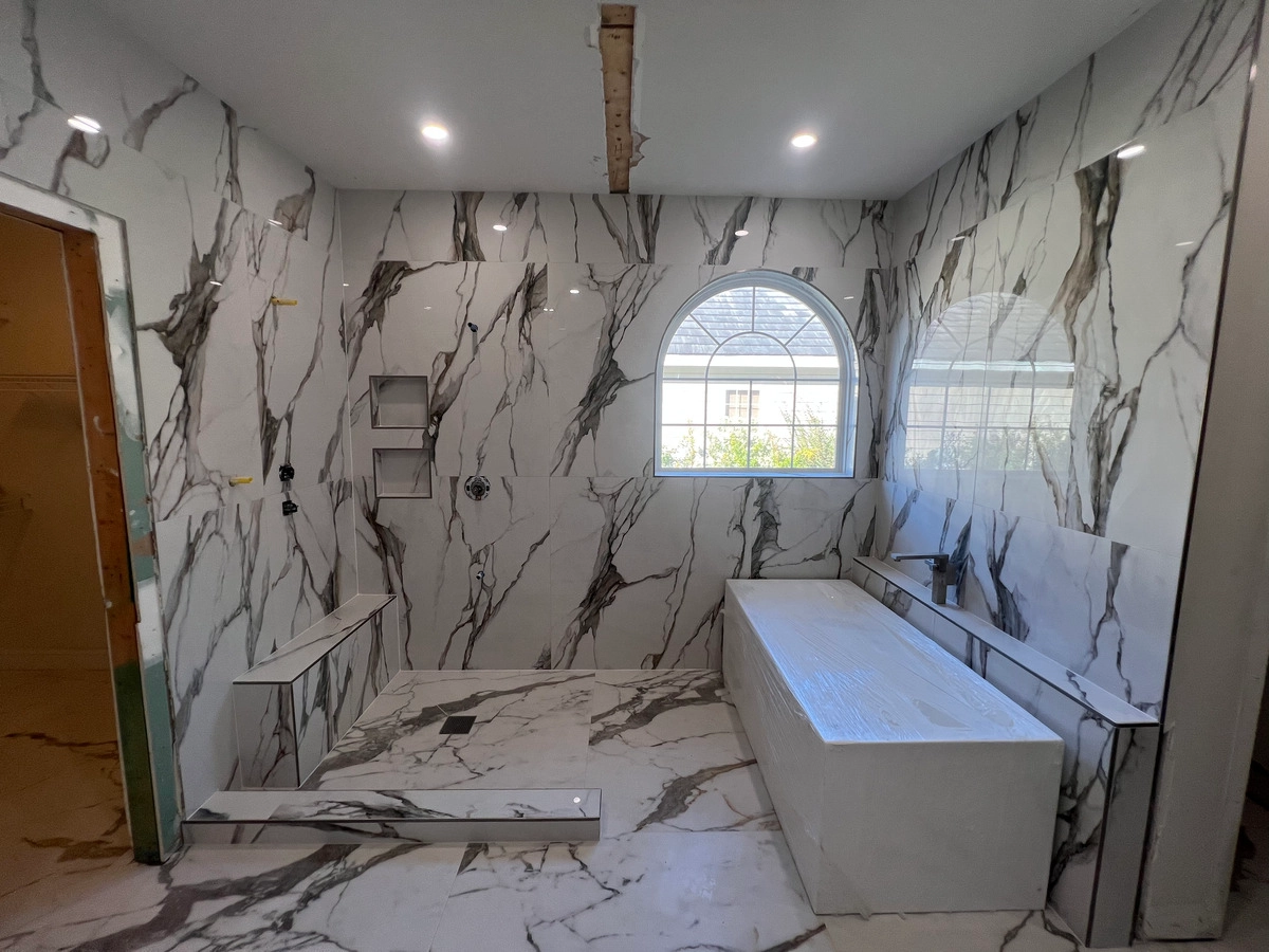 Noliv Construction bathroom remodeling, general renovations and construction, specializing in ceramic tile flooring.