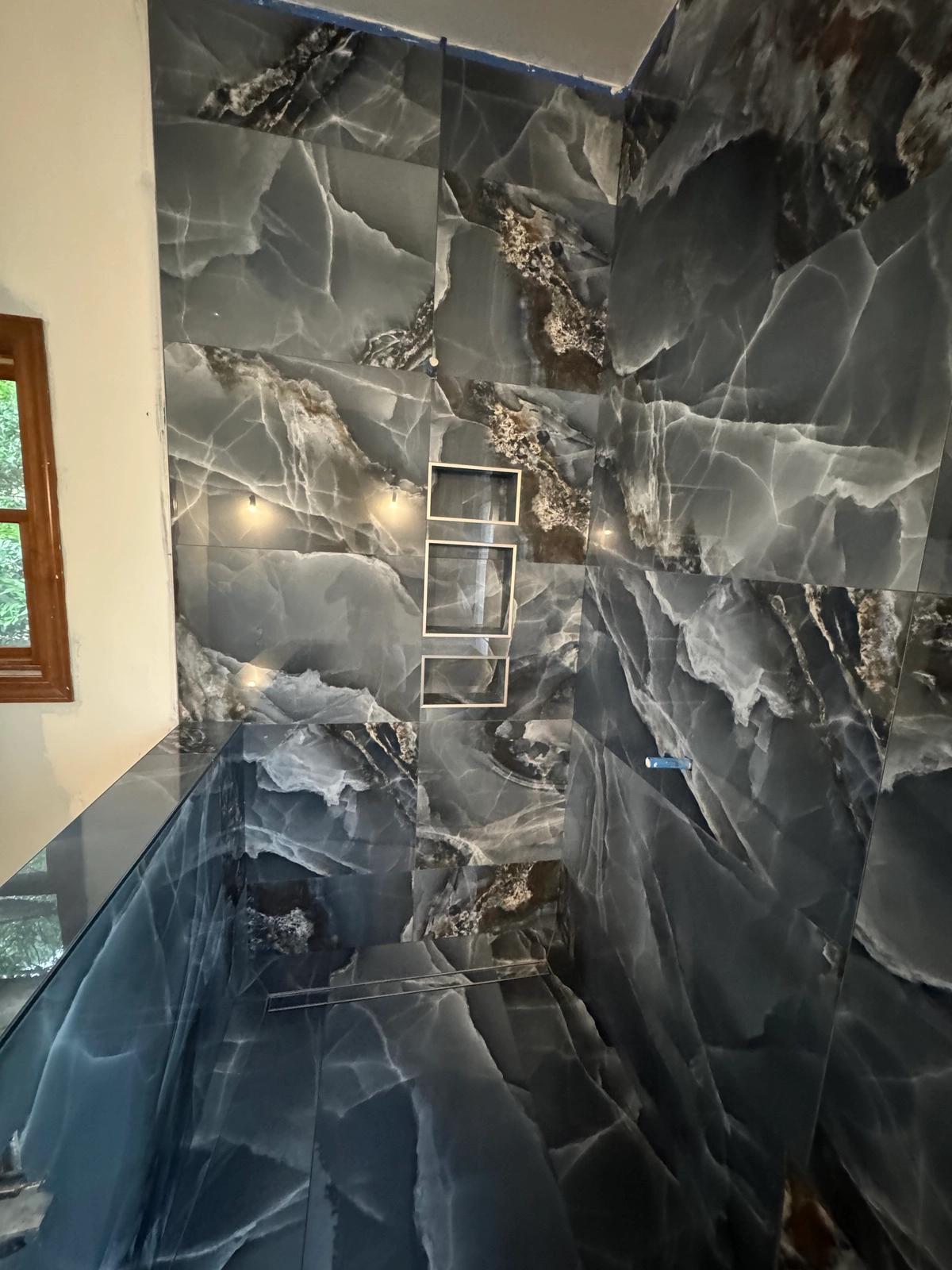 Noliv Construction bathroom remodeling, general renovations and construction, specializing in ceramic tile flooring.