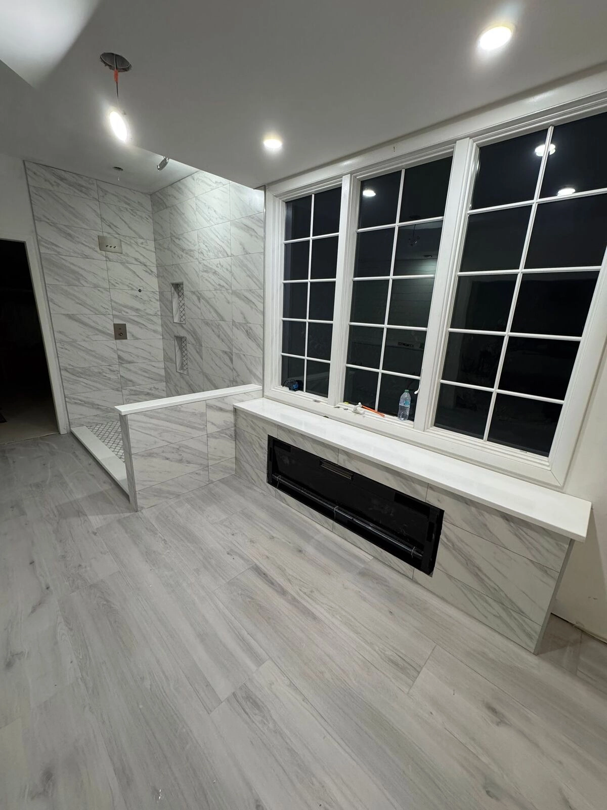 Noliv Construction bathroom remodeling, general renovations and construction, specializing in ceramic tile flooring.