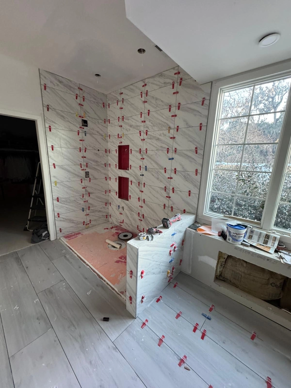 Noliv Construction bathroom remodeling, general renovations and construction, specializing in ceramic tile flooring.