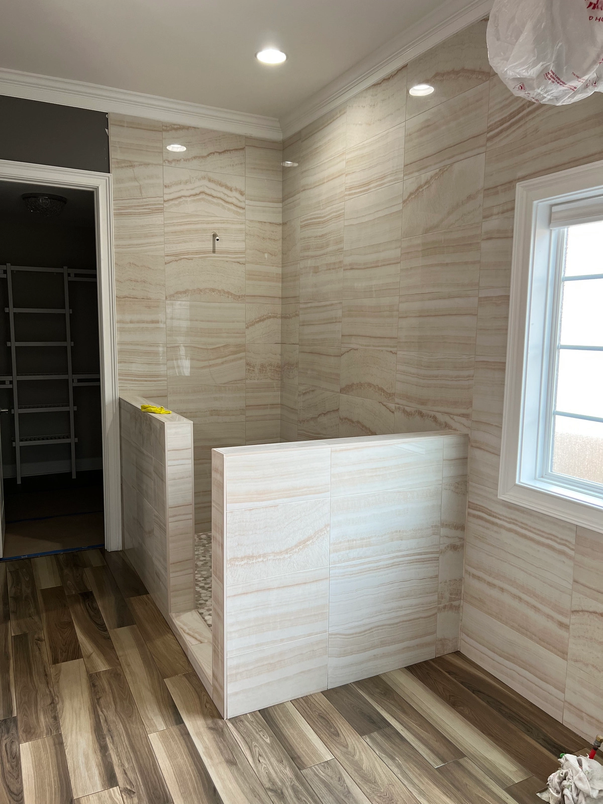 Noliv Construction bathroom remodeling, general renovations and construction, specializing in ceramic tile flooring.