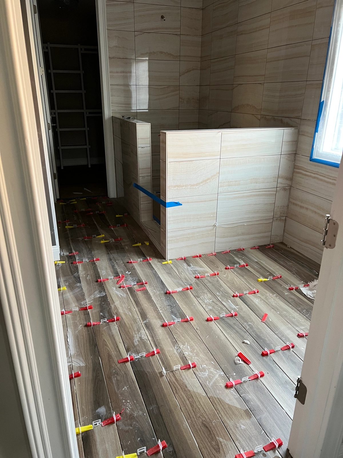 Noliv Construction bathroom remodeling, general renovations and construction, specializing in ceramic tile flooring.