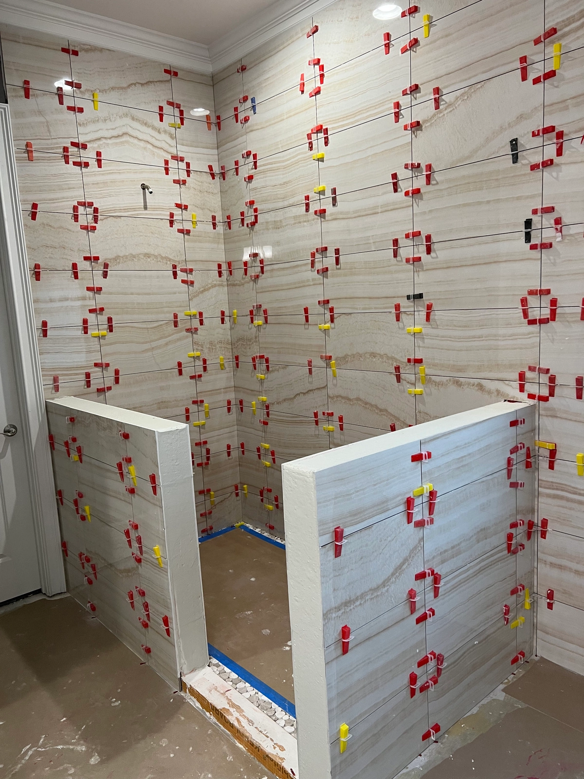 Noliv Construction bathroom remodeling, general renovations and construction, specializing in ceramic tile flooring.