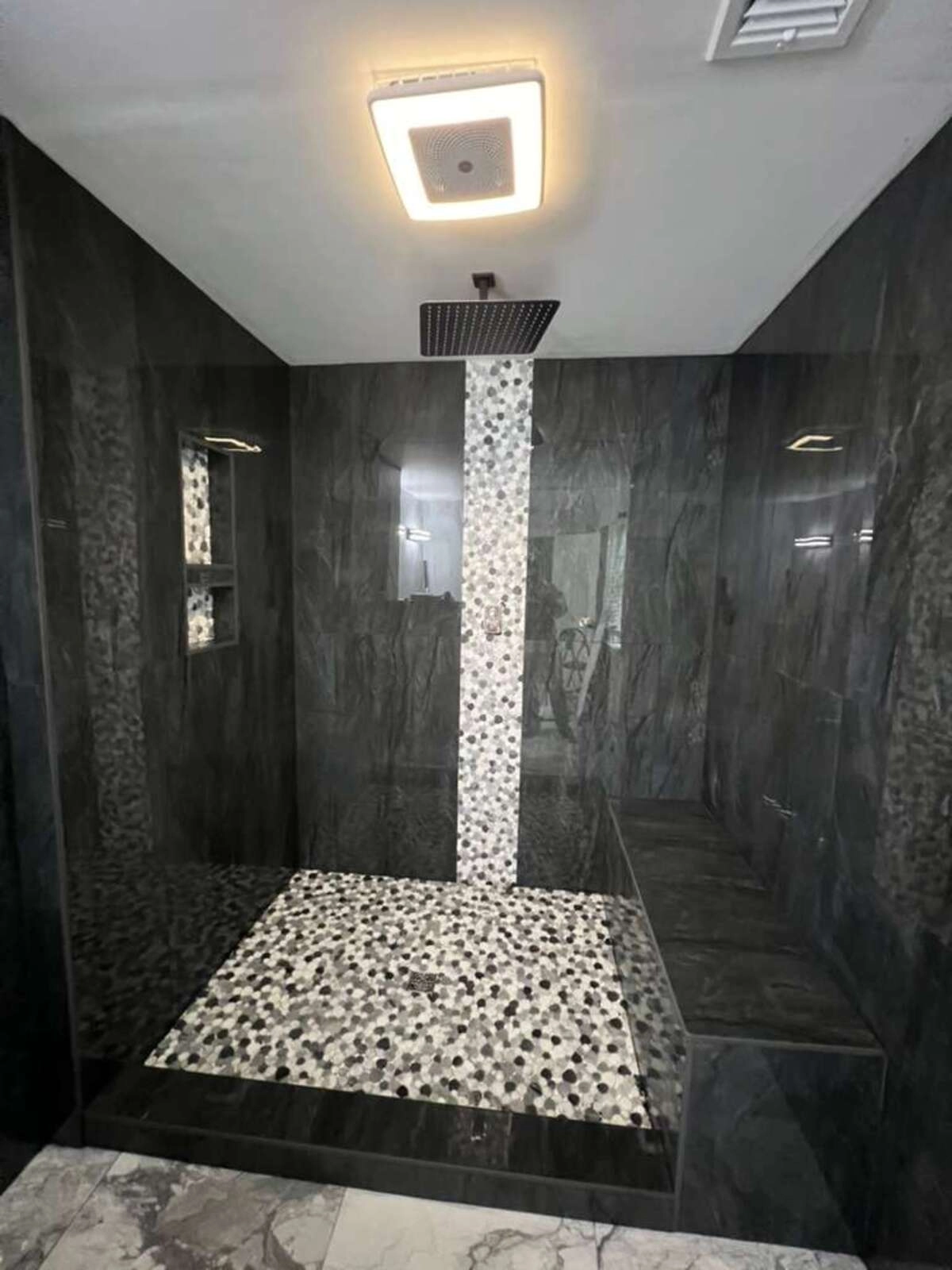 Noliv Construction bathroom remodeling, general renovations and construction, specializing in ceramic tile flooring.