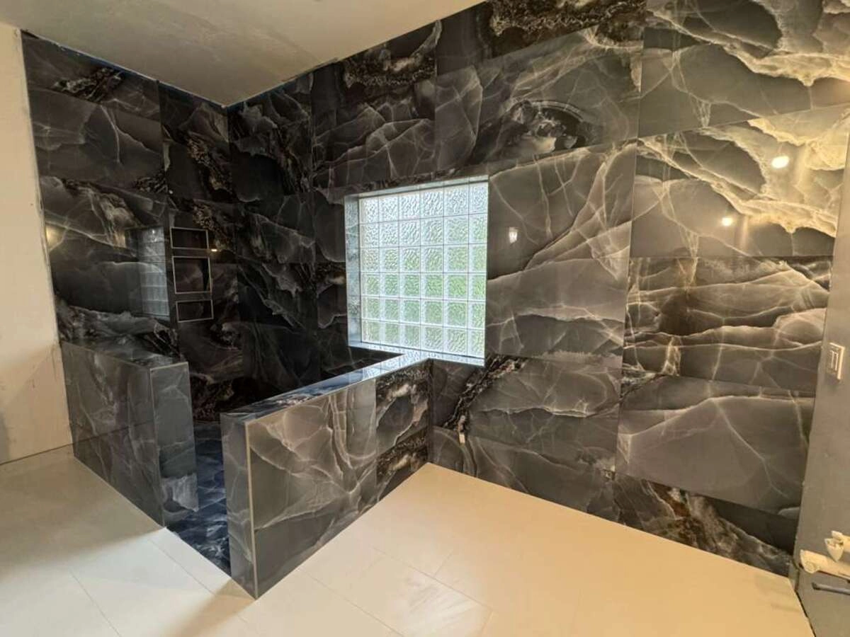 Noliv Construction bathroom remodeling, general renovations and construction, specializing in ceramic tile flooring.