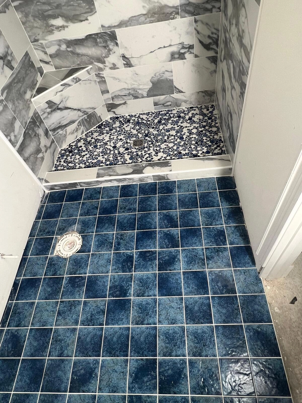 Noliv Construction bathroom remodeling, general renovations and construction, specializing in ceramic tile flooring.