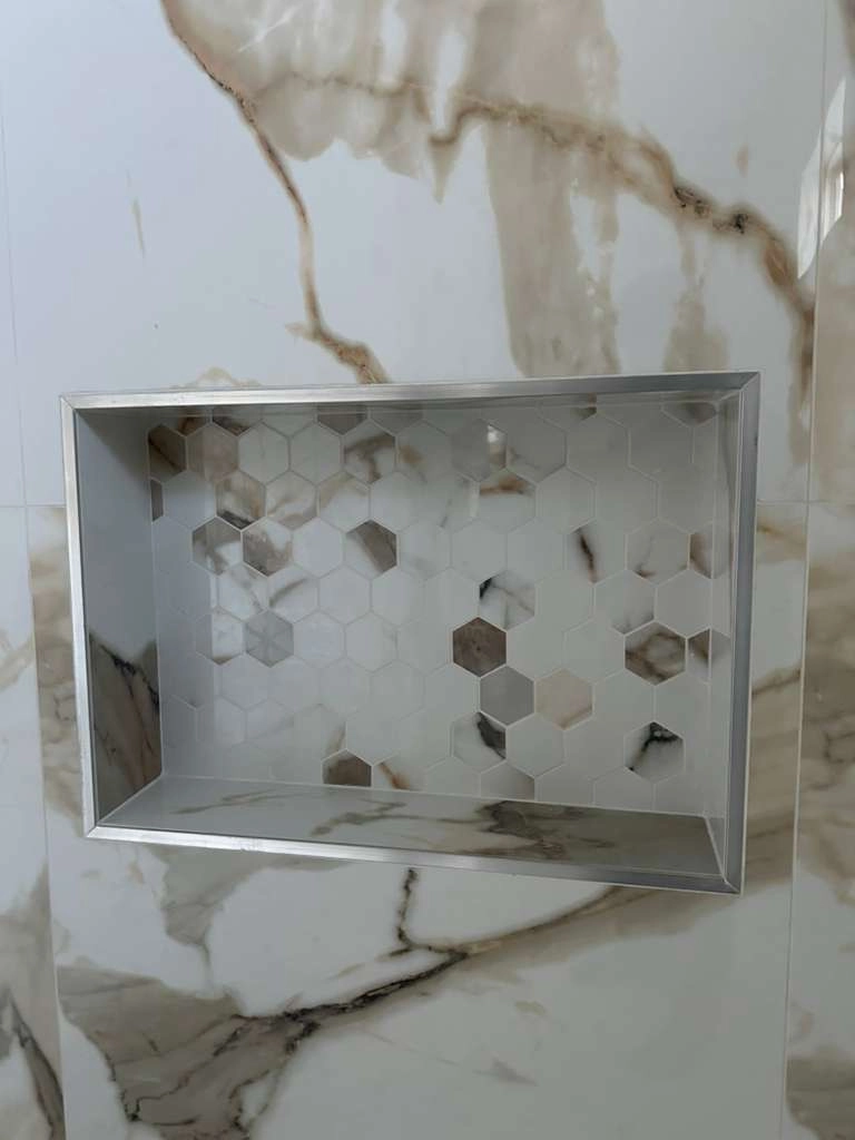 Noliv Construction bathroom remodeling, general renovations and construction, specializing in ceramic tile flooring.