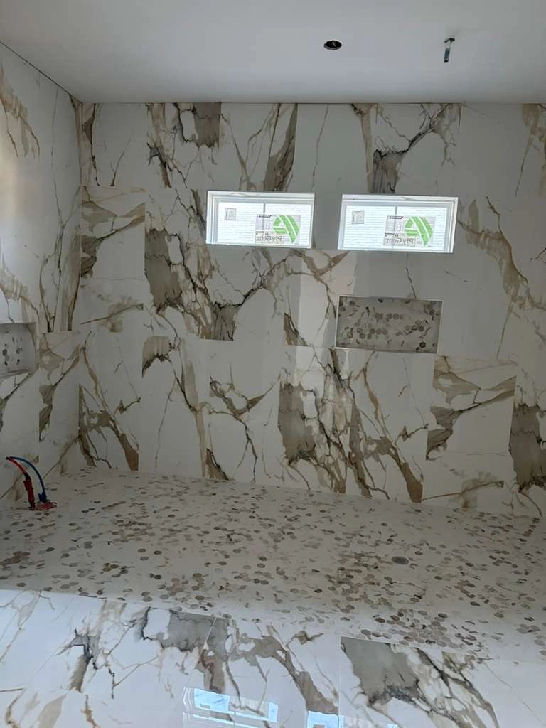 Noliv Construction bathroom remodeling, general renovations and construction, specializing in ceramic tile flooring.