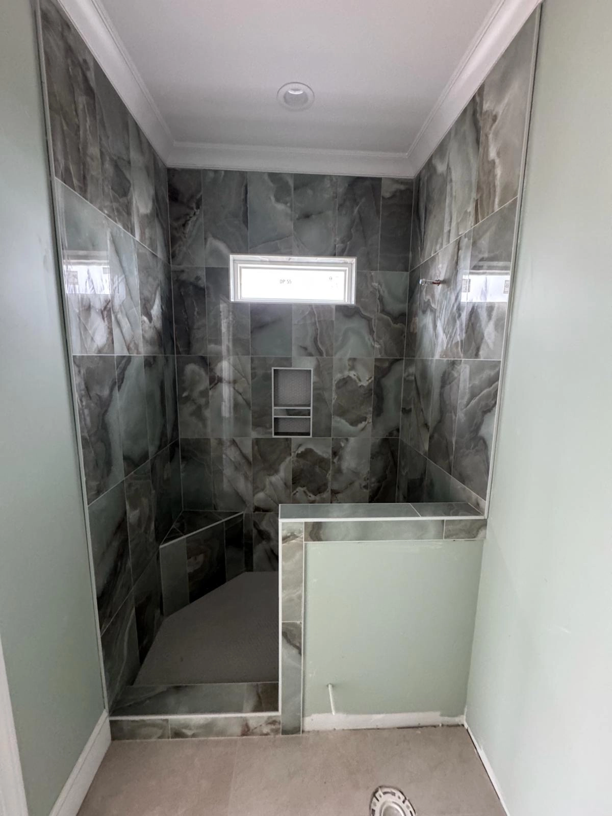 Noliv Construction bathroom remodeling, general renovations and construction, specializing in ceramic tile flooring.