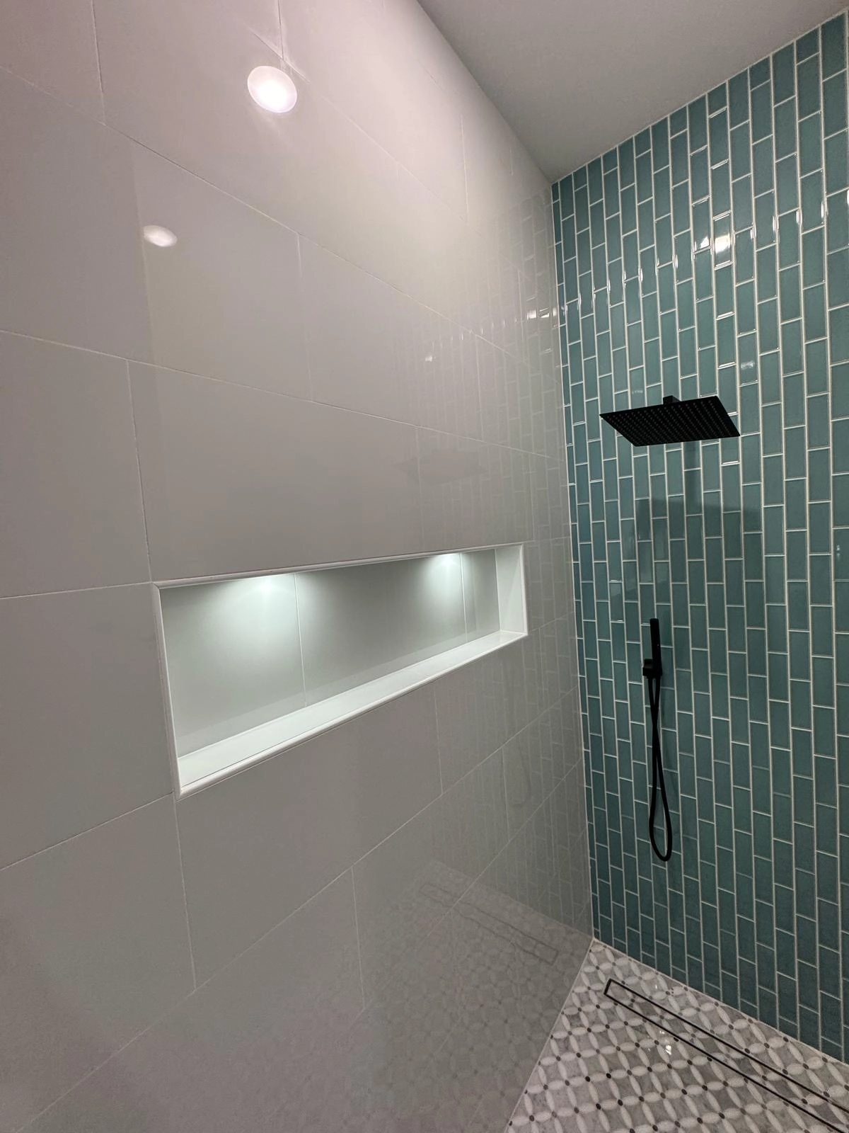 Noliv Construction bathroom remodeling, general renovations and construction, specializing in ceramic tile flooring.