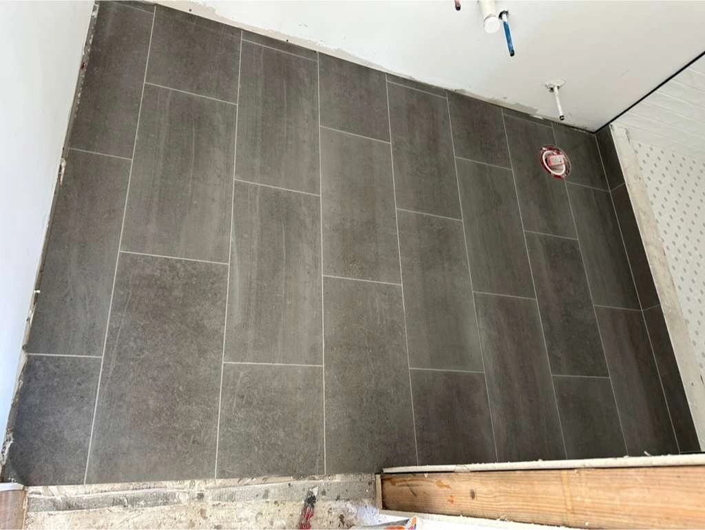 Noliv Construction bathroom remodeling, general renovations and construction, specializing in ceramic tile flooring.